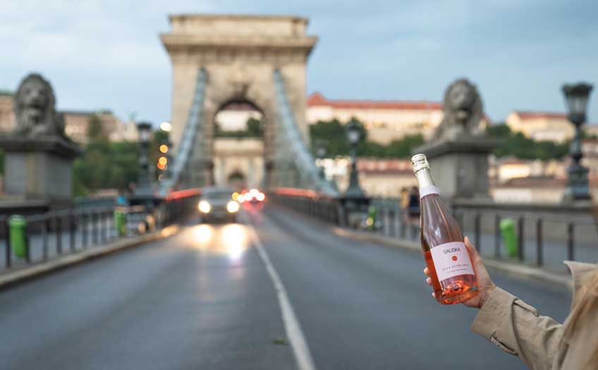 A bottle of Sauska rosé on a bridge in Budapest